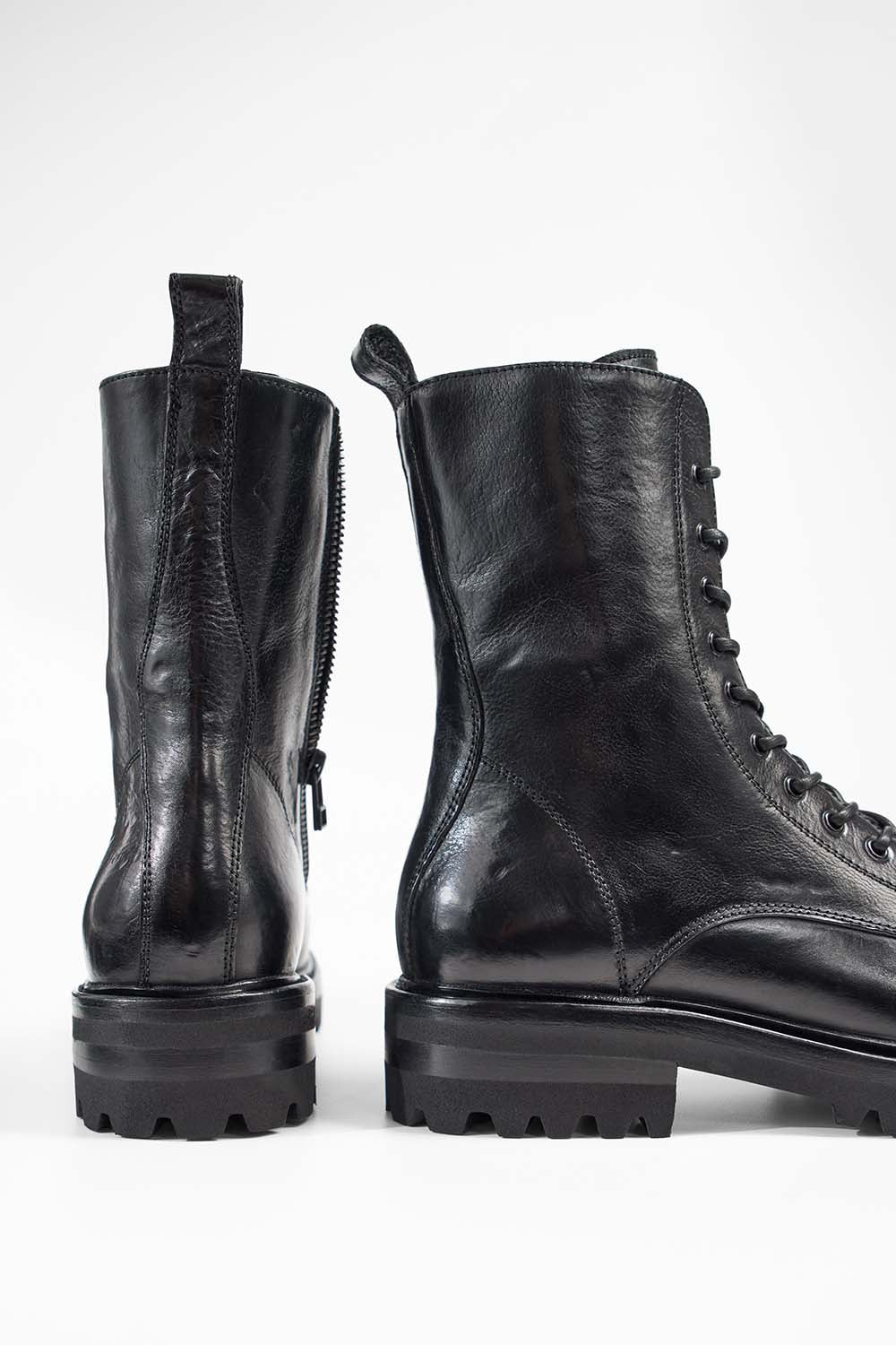 Jet-black military boots